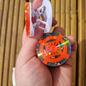 Pop Up phone holders with Black and White UC Symbol with gold flakes - side view